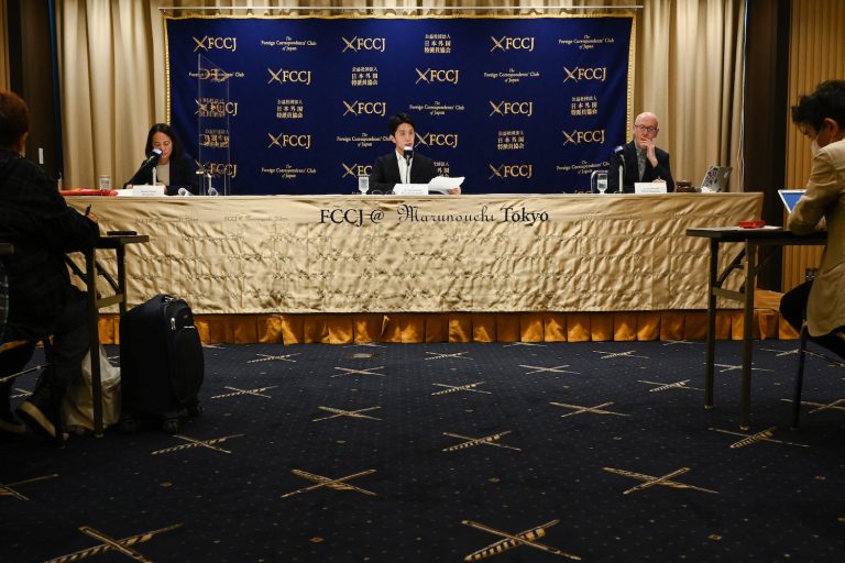 Japanese journalist Toru Kubota (C) speaks during a press conference at the Foreign Correspondents' Club of Japan in Tokyo on November 28, 2022. (AFP)