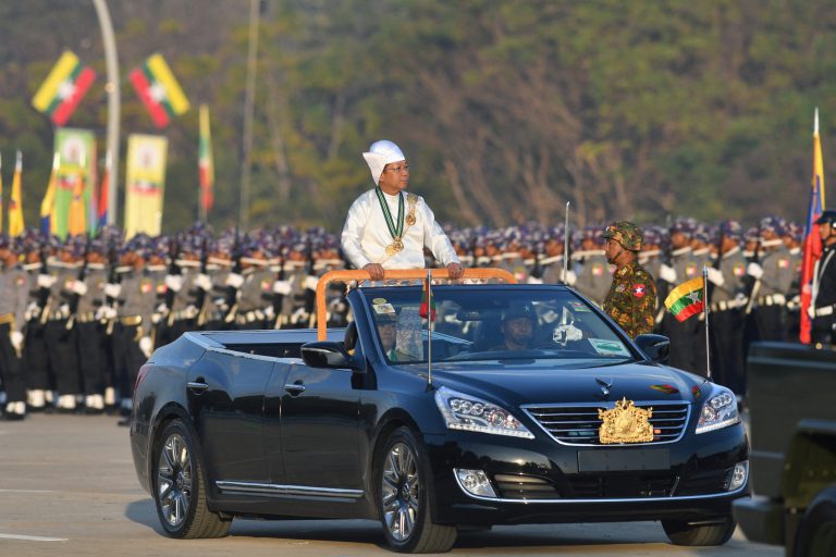 Military chief Min Aung Hlaing oversees a military display at a parade ground to mark Myanmar's Independence Day in Nay Pyi Taw on January 4, 2023. (AFP)