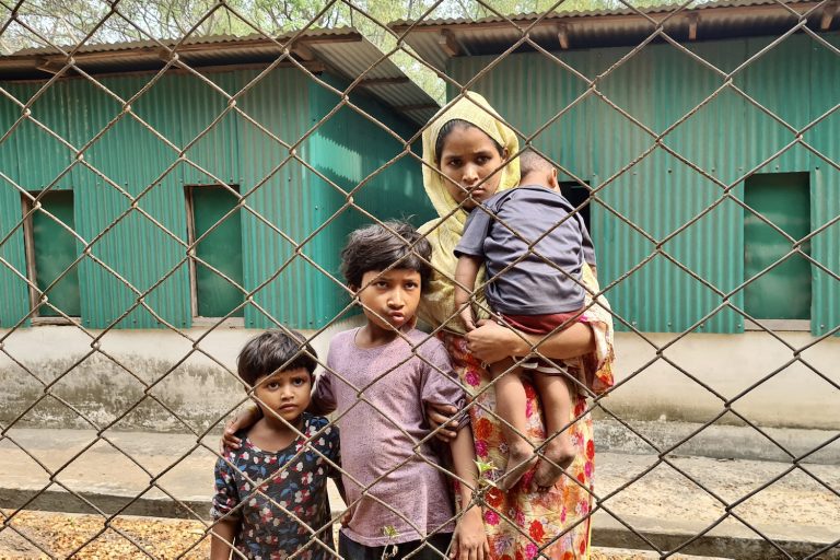 A Rohingya family arrives for a meeting with Myanmar officials in Teknaf in Bangladesh's Cox's Bazar District on March 15 as part of supposed repatriation efforts. (AFP)