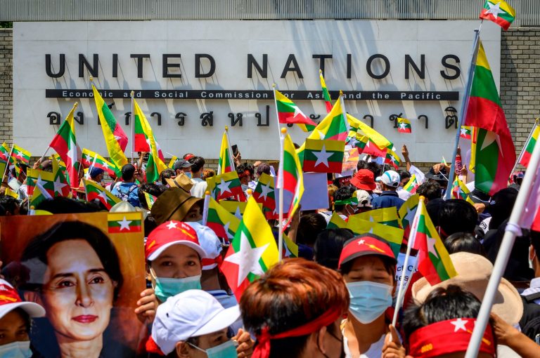 Myanmar migrants in Thailand protesting against the military coup in front of the United Nations ESCAP building in Bangkok on March 7, 2021. (AFP)