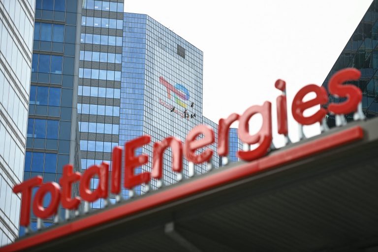 TotalEnergies unveils its new logo at a ceremony in France in May 2021 (AFP)