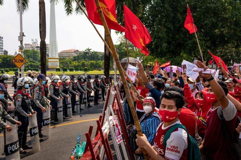 Protesters face off with police in downtown Yangon in February 2021. (Frontier)