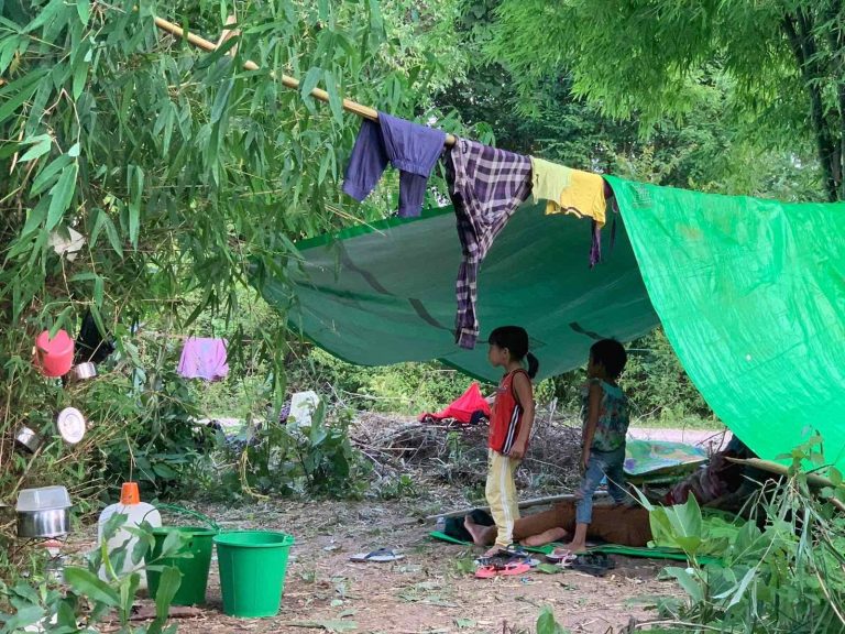Children under a makeshift dwelling at a camp for displaced people in Kayah State in June 2021. (Supplied)