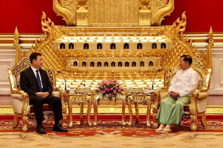 Min Aung Hlaing meets with China's Minister of Public Security Wang Xiaohong in Nay Pyi Taw on October 31. (Myanmar Military Information Team | AFP)