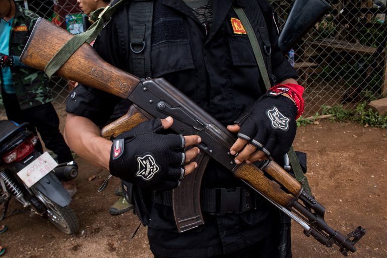 Members of the Karenni Nationalities Defence Force and Kareni Army at a checkpoint near Demoso, in eastern Kayah State, on October 19, 2021. (AFP)