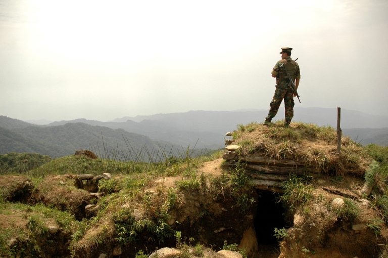 A Kachin Independence Army fighter overlooks a valley in Kachin State in May 2012. (AFP)