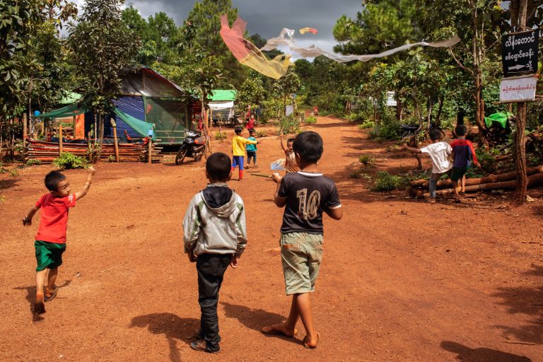 Children play at a camp for internally displaced people in Kayah State's Demoso Township in October 2023. Mental health practitioners worry about the mental burden of the post-coup conflict on Myanmar's youth. (AFP)