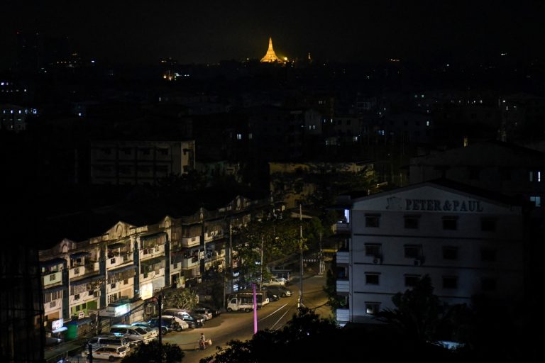 Yangon after dark, when junta authorities seeking conscripts are reportedly seizing young men on the street or during household inspections. (AFP)