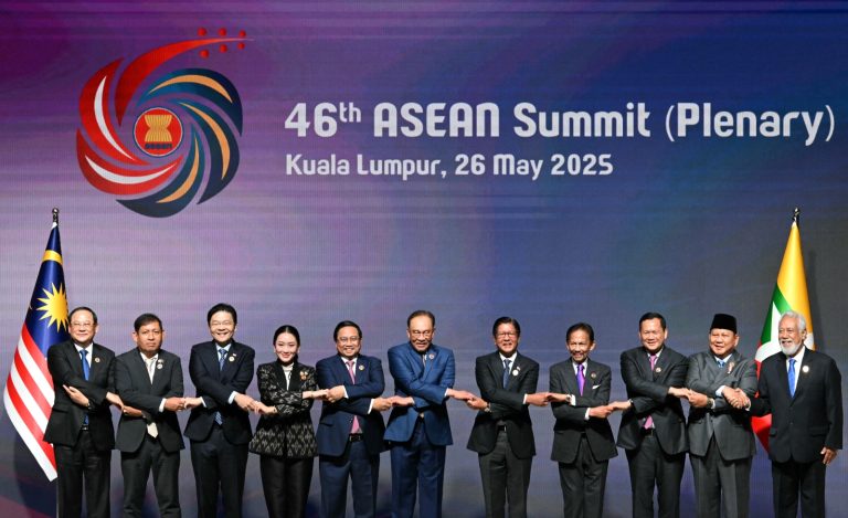 ASEAN leaders pose alongside Myanmar junta bureaucrat U Aung Kyaw Moe (second from left) at the bloc’s summit in Kuala Lumpur on May 26. (AFP)