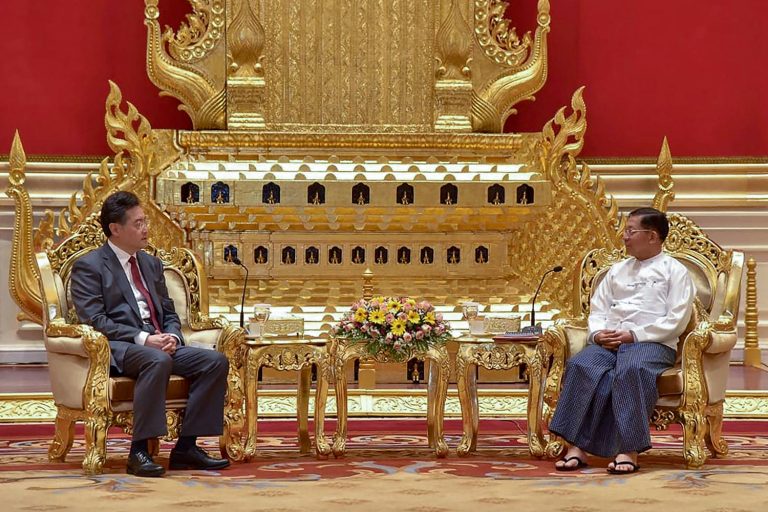 Min Aung Hlaing and Chinese foreign minister Qin Gang meet in Nay Pyi Taw on May 2. (AFP)