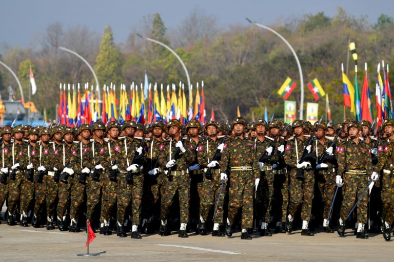 Soldiers march at a parade ground to mark Myanmar's Independence Day in Nay Pyi Taw on January 4, 2023. (AFP)