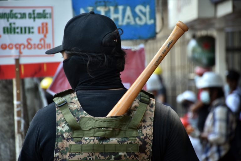 An anti coup protester in Yangon last year dresses for armed confrontation. (Frontier)