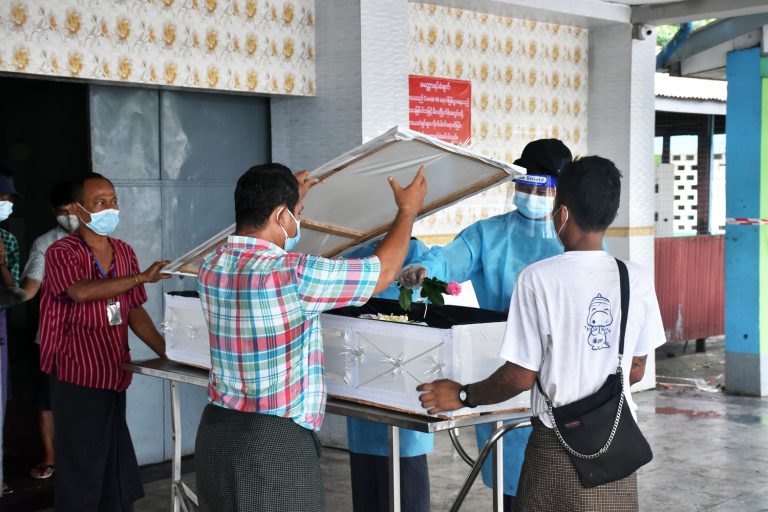 Community volunteers and staff assist with body delivery and cremation at Yayway cemetary in Yangon in July 2021 (Frontier)