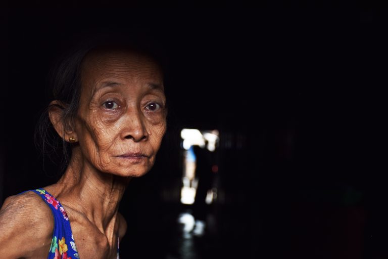 An elderly resident of Hlaing Tharyar township's Yay Okkan Ward. (Steve Tickner | Frontier)