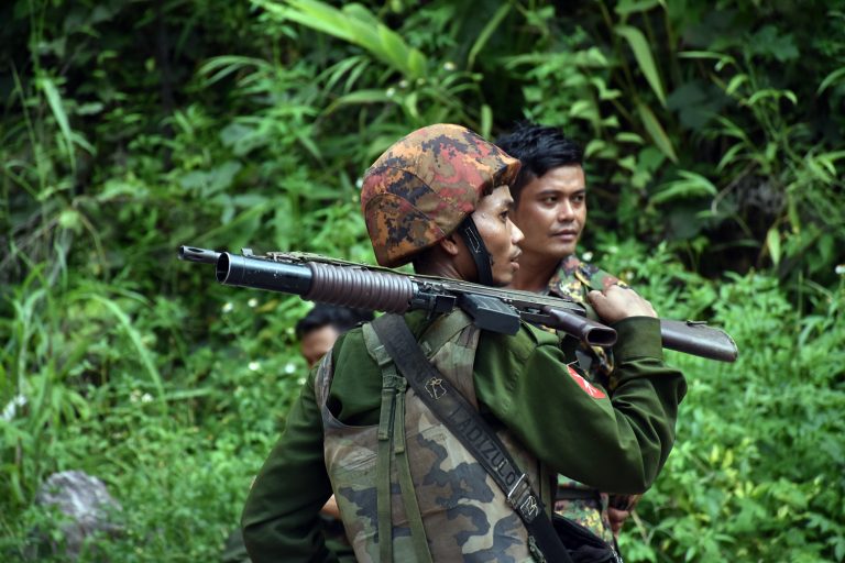 Tatmadaw soldiers guard the Goktwin Bridge on the Mandalay-Muse highway in northern Shan State on August 20, 2019. (Steve Tickner | Frontier)