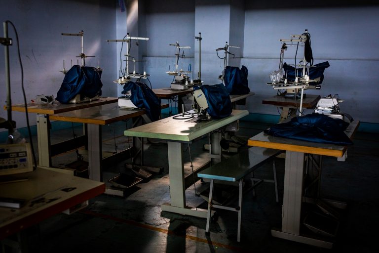 Sewing machines at an empty garment factory in Yangon that was closed in 2020 due to COVID-19. (Hkun Lat | Frontier)