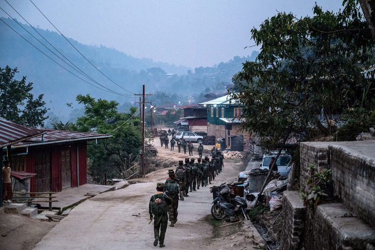 Members of the Ta'ang National Liberation Army patrol in Namkhan Township, in northern Shan State, on March 9. (AFP)