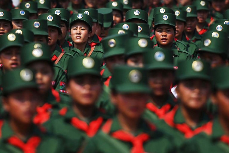 United Wa State Army soldiers participate in a military parade to mark the 30th anniversary of a ceasefire with the Tatmadaw in the Wa capital Panghsang, in northern Shan State, on April 17, 2019. (AFP)