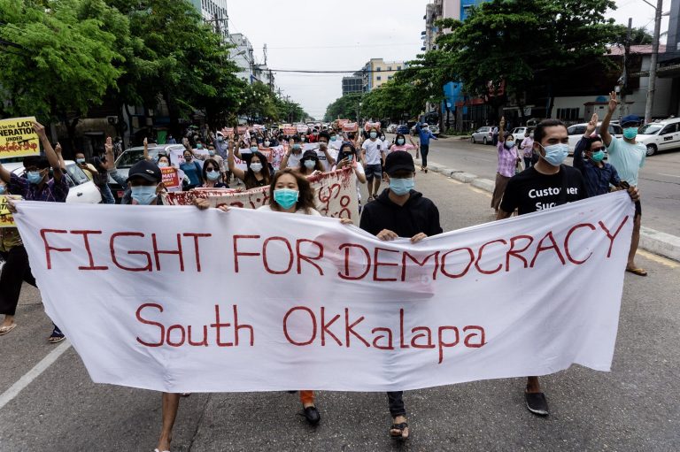 Protesters march during a demonstration against the military coup in Yangon on April 30, 2021. (AFP)