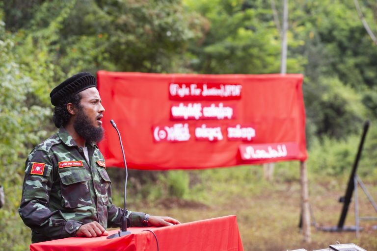 Mechanic turned resistance commander Ko Bobo addresses his troops in Kayah State's Demoso Township on October 27 last year, as part of a ceremony to mark the one-year anniversary of the founding of the Justice People’s Defence Force. (Mar Naw | Frontier)