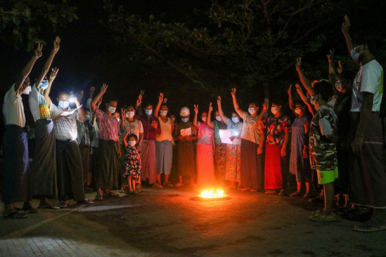 Protesters hold a night rally in Sagaing Region, which has been subjected to internet cuts and disinformation campaigns (Frontier)