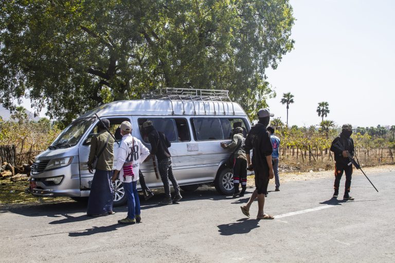 Resistance fighters aligned to the National Unity Government man a checkpoint in Sagaing Region in February 2022. (Mar Naw | Frontier)