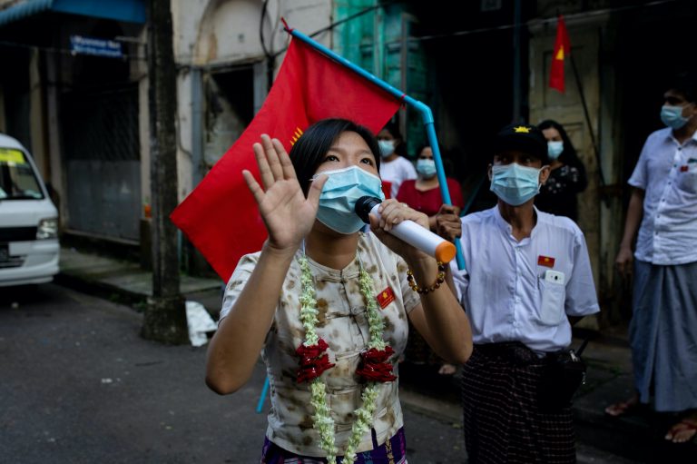 Democratic Party for a New Society candidate Ei Tinzar Maung campaigns on the streets of Yangon on November 2. On November 6 all campaigning wrapped up, as parties prepared to observe a "silent day" immediately before the November 8 election. (Hkun Lat | Frontier)