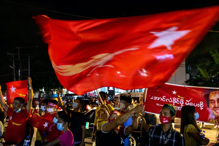 National League for Democracy supporters celebrate victory in front of the party's Yangon office on November 8. (Hkun Lat | Frontier)