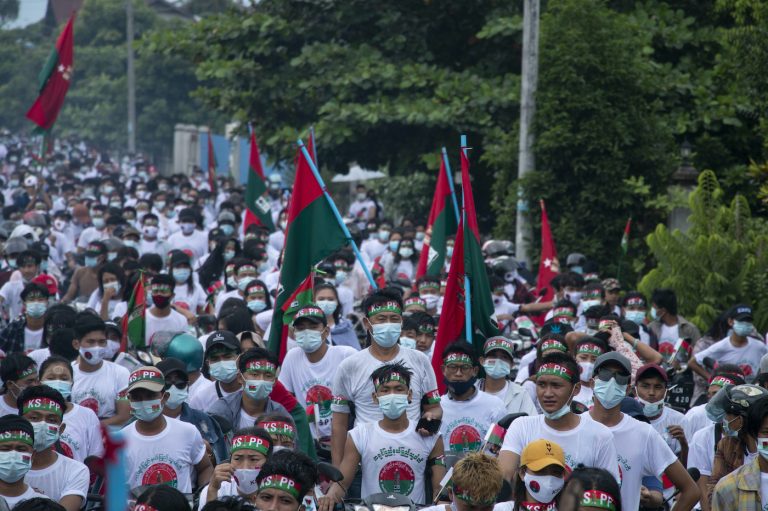 Supporters of the Kachin State People's Party march in a campaign rally in the state capital of Myitkyina on October 17. (Zau Ring Hpra)