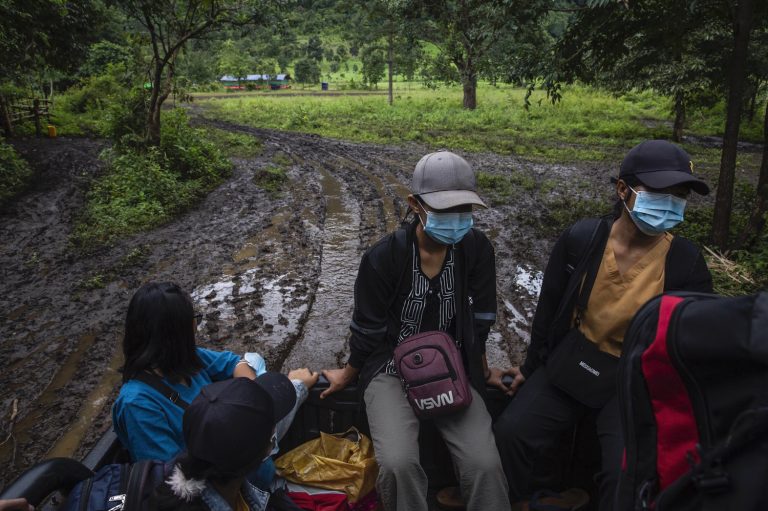 Members of a mobile healthcare team navigate rough roads in Kayah State to provide healthcare to IDPs last year. (Mar Naw | Frontier)