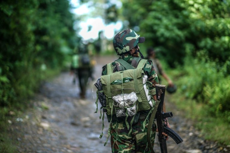 Kachin Independence Army soldiers patrol near the armed group's headquarters of Laiza in January 2021. (Yawng Htang | Frontier)