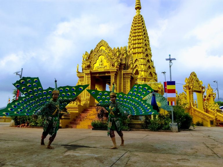 Dancers Visakha and Naroth perform a traditional Kula dance in front of Wat Yat, in the Cambodian town of Pailin, on May 11. (Daniel Zak | Frontier)