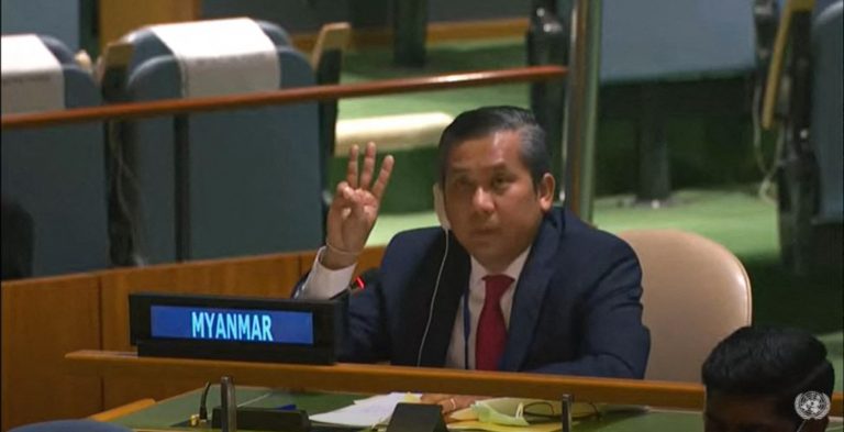 Myanmar's ambassador to the United Nations U Kyaw Moe Tun gives the three-finger salute while addressing an informal meeting of the UN General Assembly on February 26. (AFP / UN)