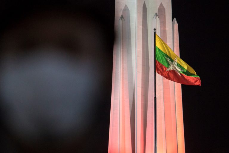 The national flag flutters during a ceremony to mark Myanmar's 73rd Independence Day in Yangon on January 4. (AFP)