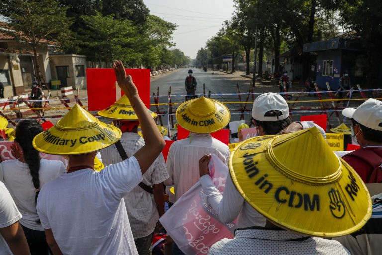 Protestors wear hats in support of the Civil Disobedience Movement in Yangon shortly after the coup in February 2021. (Frontier)