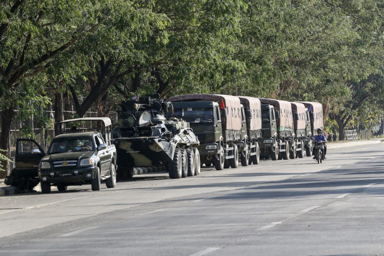 Military tanks and trucks stand guard outside Nay Pyi Taw's Sibin Guesthouse on February 1, the first day of the ongoing military coup. (Nyein Su Wai Kyaw Soe | Frontier)