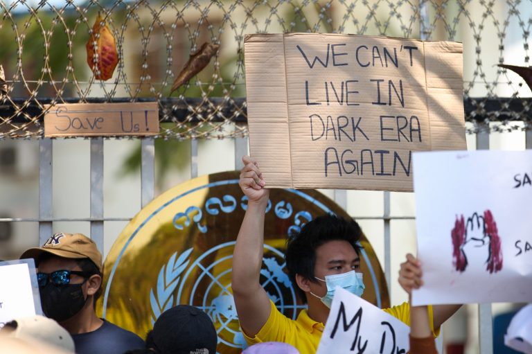 Anti-coup protesters gather on Natmauk Road outside the United Nations office in Yangon on February 10. (Frontier)