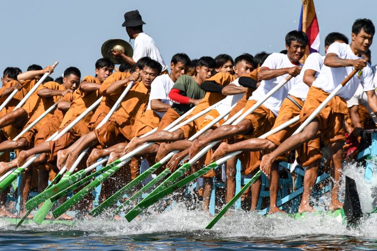 Men practice leg-rowing during the Phaung Daw Oo pagoda festival on Inle Lake, southern Shan State, on October 19. (AFP)