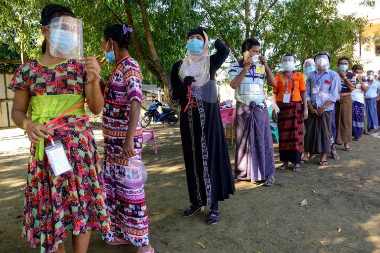 Voters queue to cast their ballots in the Rakhine State capital Sittwe, where voting went ahead on November 8 while most of the state was excluded. (AFP)