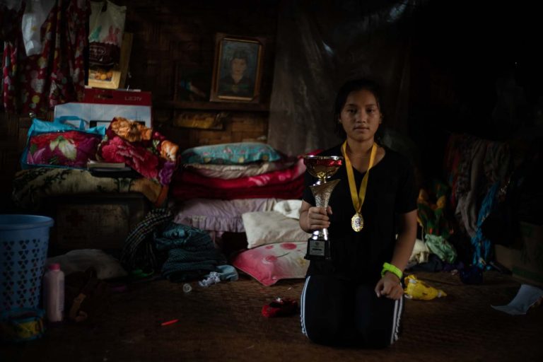 Seng Nu fled her village of Ta Law Gyi in 2011. Living at the Shwe Zet IDP camp (pictured) in Myitkyina, she has acquired a black belt in karate and competed in Singapore and Japan. (Hkun Li | Frontier)