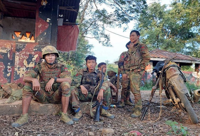 Members of the Ta'ang National Liberation Army gather in a captured military base in northern Shan State’s Hsipaw town on October 15. (AFP)