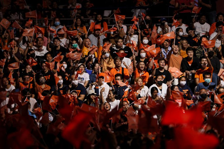 Supporters cheer during Move Forward Party's final campaign event in Bangkok on May 12, 2023. (AFP)