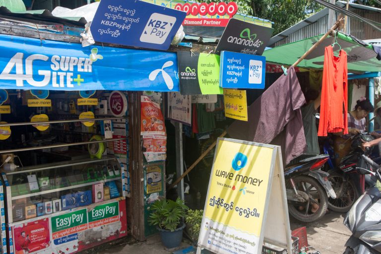 Mobile money customers in Myanmar have been spoilt for choice, with five licensed non-bank operators and numerous apps linked to private banks. (Thuya Zaw | Frontier)