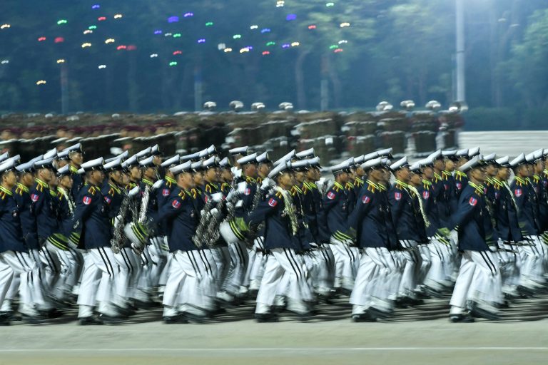 Junta soldiers parade during a ceremony to mark Myanmar's Armed Forces Day in Nay Pyi Taw on March 27. (AFP)