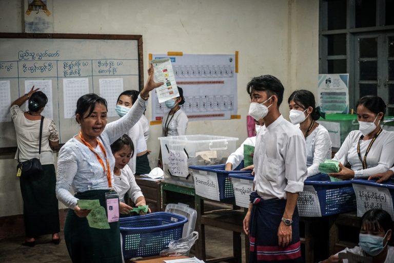 Votes are counted at a polling station in Kaleh village tract in Kayin State's Kyainseikgyi Township on the evening of November 8. (Sa Yarzar Aung | Frontier)