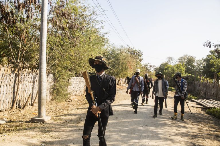 Members of a People's Defence Force aligned with the National Unity Government patrol Sagaing Region's Tabayin Township in February 2022. (Mar Naw | Frontier)