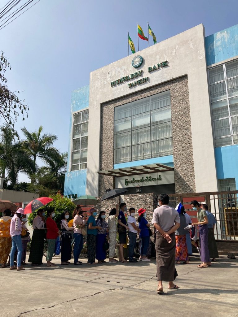 Customers queue outside of a branch of the military-run Myawaddy Bank in Yangon's Yankin Township on February 16. (Frontier)