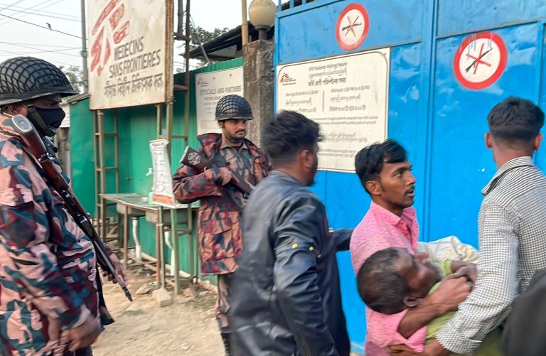 A man wounded by a stray bullet from fighting in northern Rakhine State is taken for emergency aid to a MSF clinic in Cox’s Bazar district, in Bangladesh, on February 4. (AFP)