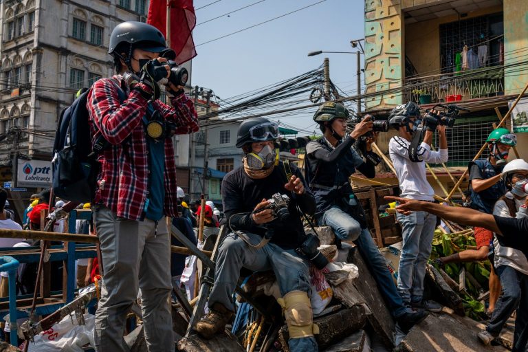 Journalists covering an anti-coup protest in Yangon's Hlaing Township in March 2021. (Frontier)