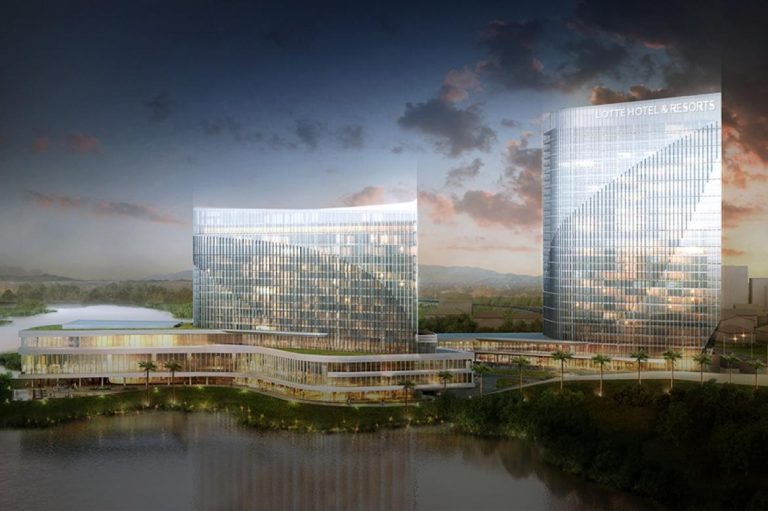 The upscale Lotte hotel is seen rising above Inya Lake in central Yangon.